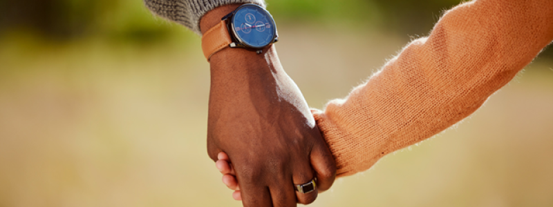 Parent holding child's hand