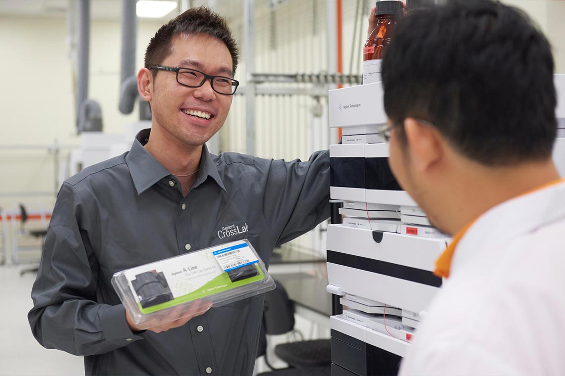 CrossLab specialist working with a lab technician