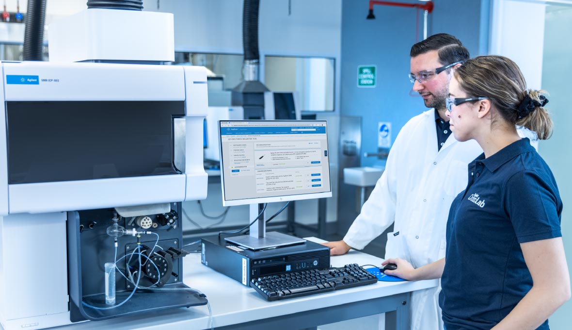 Lab technicians working with an Agilent 5900 ICP-OES system