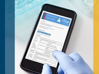 Smart phone with Agilent CrossLab Smart Alerts on screen