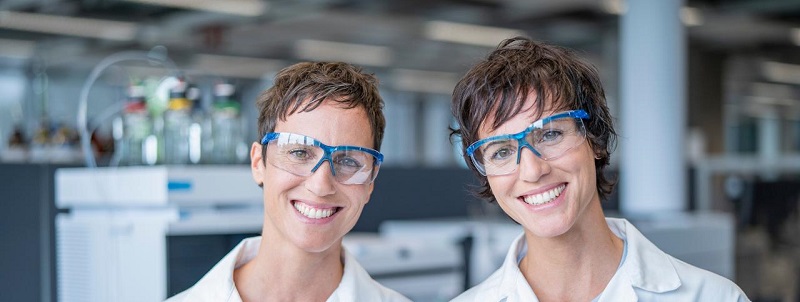 Two women with protective glasses