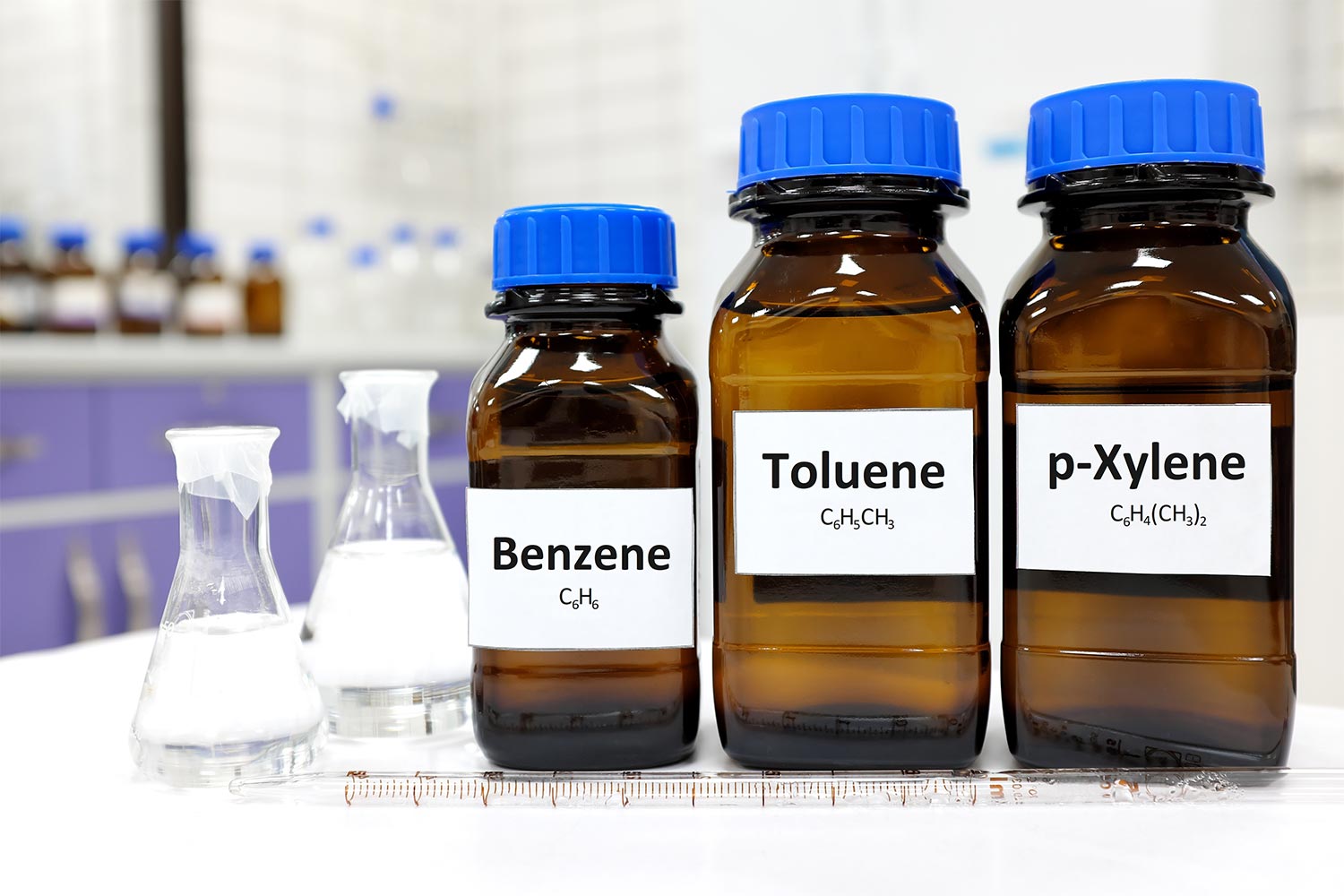 Bottles of benzene, toluene, and p-xylene