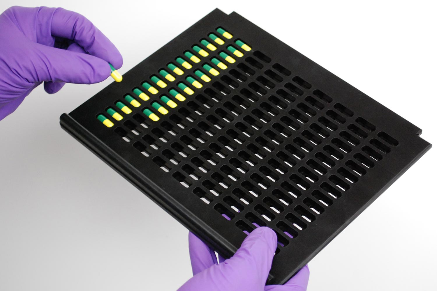 Placing capsules on a TRS100 tray