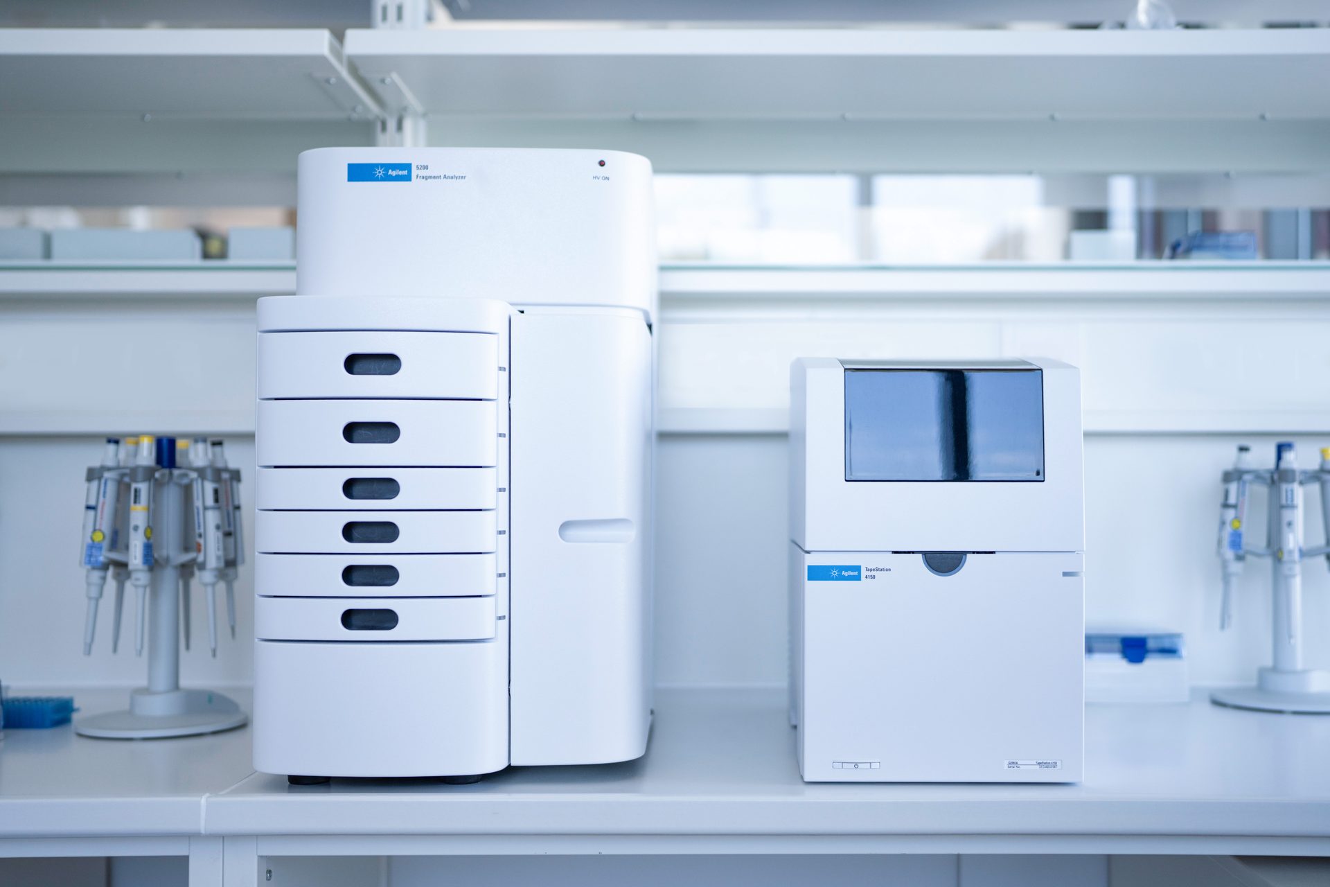 Agilent 5200 Fragment Analyzer and Agilent 4150 TapeStation side-by-side in a sample QC lab