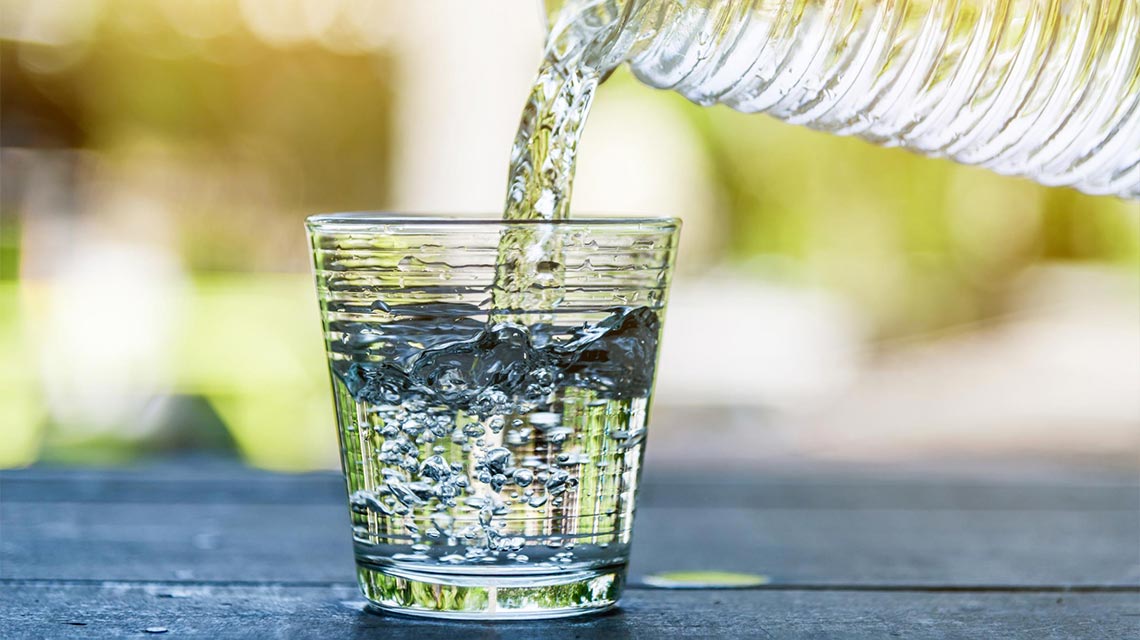 Water being poured into a glass