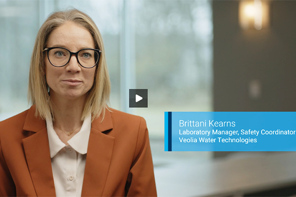 woman sat talking to camera