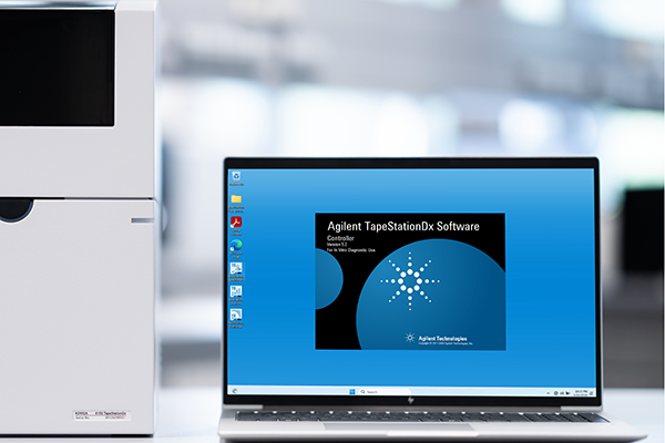 Agilent TapeStationDx software displayed on a laptop alongside a TapeStationDx instrument.