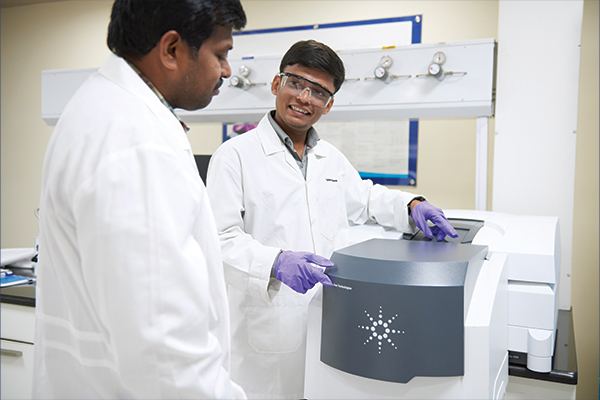 Scientists using a Cary 7000 UMS